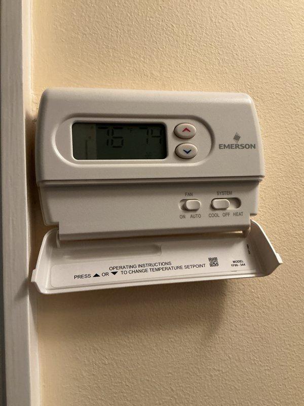 Completed comprehensive Gold AC inspection on 7-year-old attic-mounted space pack system. Unit confirmed operational with thermostat reading 72 degrees. Inspected air handler located in attic space with adequate insulation coverage, verified all connections to flexible ductwork, and assessed overall equipment condition. Advised customer to maintain clear area around outdoor condenser unit, removing any debris and animal waste to ensure optimal system performance and airflow.