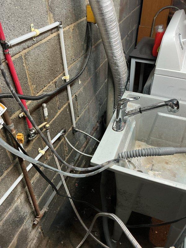 Replaced exterior hose bib with Proflo 14" anti-siphon frost-free brass sillcock featuring 1/4" MPT x SWT connections in basement utility room. Part was sourced from shop inventory and installed to prevent freezing and backflow contamination of potable water supply.