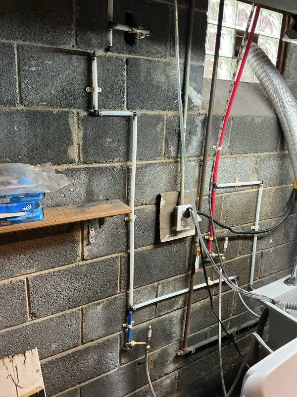 Replaced exterior hose bib with Proflo 14" anti-siphon frost-free brass sillcock featuring 1/4" MPT x SWT connections in basement utility room. Part was sourced from shop inventory and installed to prevent freezing and backflow contamination of potable water supply.