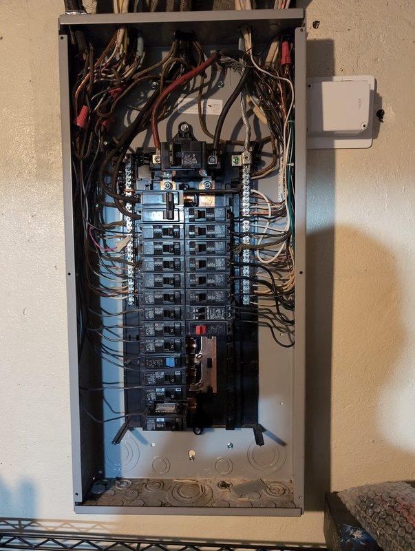Responded to customer report of circuit issues and flickering lights in front room. Inspected main electrical panel and verified proper breaker operation, connections, and circuit integrity. Examined exterior electrical service equipment including meter base and conduit installation to ensure proper grounding and service delivery. All circuits tested and confirmed operational with no loose connections or overloaded breakers identified.