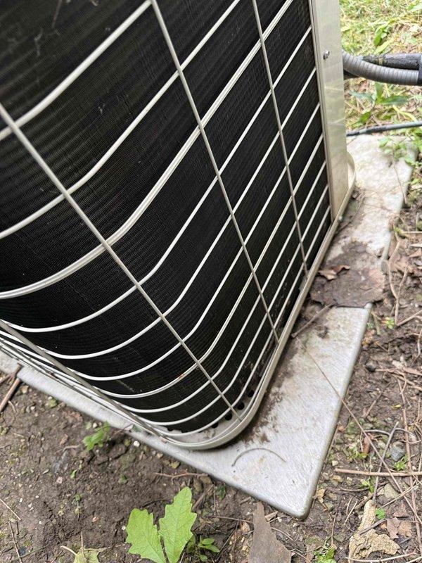Completed comprehensive Gold AC inspection on 10+ year old air conditioning system with air handler located in basement. Performed electrical diagnostics using clamp meter to verify amperage draws and system performance, inspected outdoor condenser unit on concrete pad, and evaluated overall system operation. Advised customer that area surrounding condenser should be kept clear of debris and animal waste for optimal airflow and system efficiency.