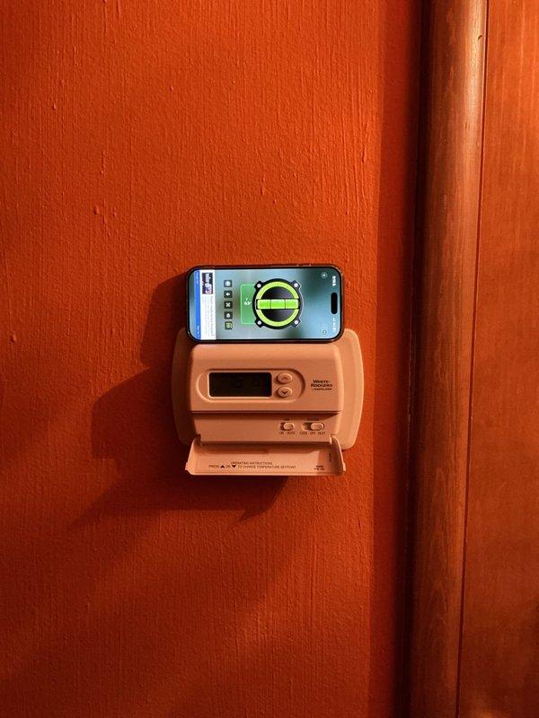 Responded to service call for blank thermostat display on Lennox forced air heating system located in basement. Diagnosed non-functional thermostat and replaced existing unit with WiFi-enabled programmable thermostat, ensuring proper leveling and wiring connections. Replaced HVAC system air filter and verified proper system operation upon completion.