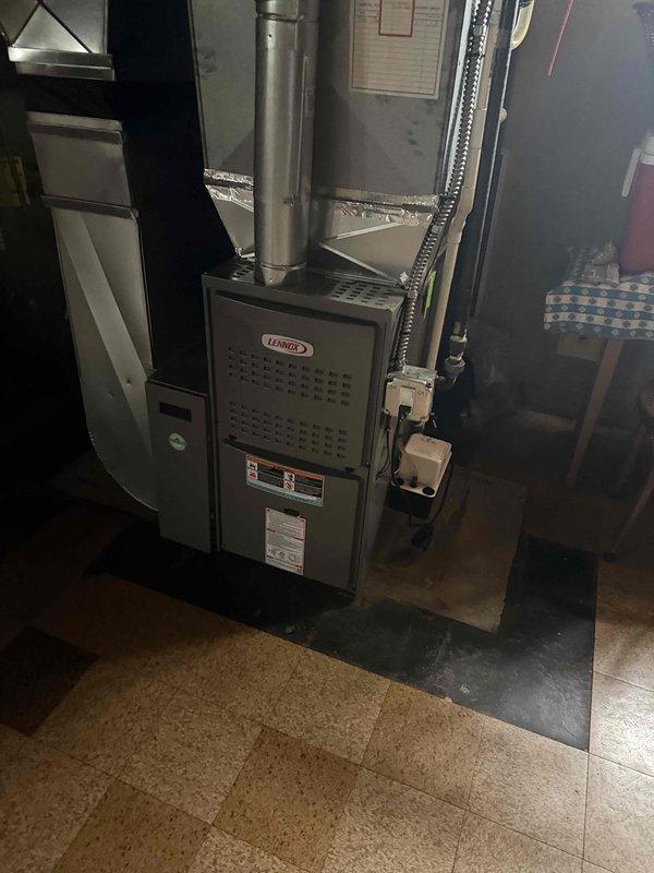 Responded to service call for blank thermostat display on Lennox forced air heating system located in basement. Diagnosed non-functional thermostat and replaced existing unit with WiFi-enabled programmable thermostat, ensuring proper leveling and wiring connections. Replaced HVAC system air filter and verified proper system operation upon completion.