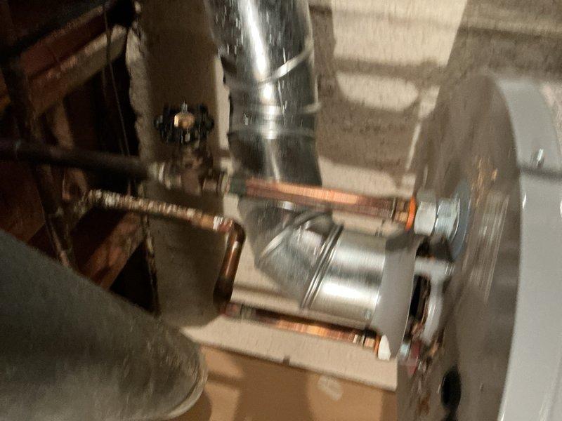 Completed preventive maintenance service on two 15-year-old air conditioning units for Blue Plan membership customer preparing for summer season. Both systems were operating normally with no reported issues. Performed comprehensive inspection and routine maintenance on downstairs unit and attic-mounted unit, navigating tight attic access space to service equipment. Inspected outdoor condenser units, verified proper operation of cooling systems, checked refrigerant levels, cleaned components as needed, and confirmed all electrical connections were secure. Both AC units and furnace system tested and found to be heating and cooling properly upon completion of scheduled maintenance visit.
