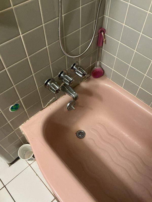 Returned to property to replace faulty thermostatic cartridge in three-handle tub and shower valve assembly. Removed old cartridge, installed new brass thermostatic cartridge with O-ring seal, tested temperature control operation, and verified proper water flow and mixing function.