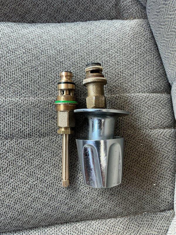 Returned to property to replace faulty thermostatic cartridge in three-handle tub and shower valve assembly. Removed old cartridge, installed new brass thermostatic cartridge with O-ring seal, tested temperature control operation, and verified proper water flow and mixing function.