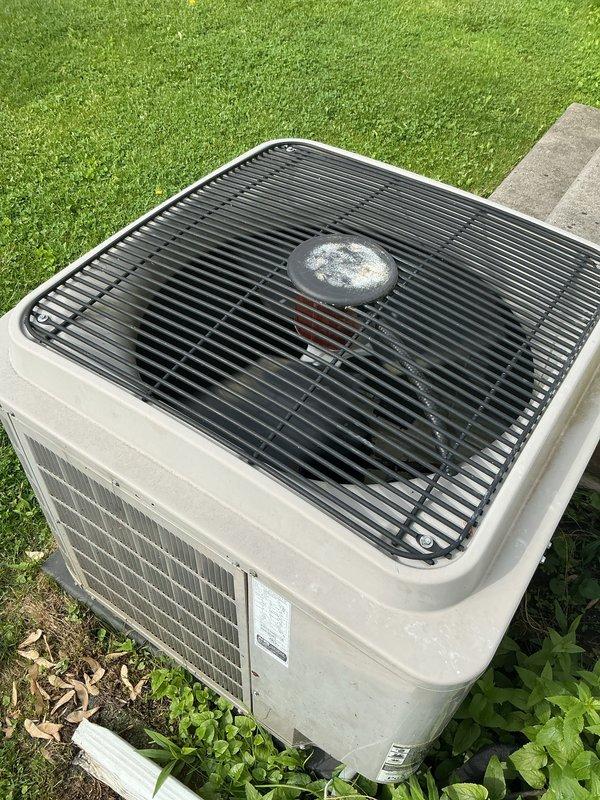 Completed comprehensive Gold AC inspection on residential cooling system with air handler located in basement and outdoor condensing unit less than 10 years old. Performed multi-point inspection including visual assessment of outdoor unit condition, cabinet integrity, and surrounding area. Advised customer to maintain clear perimeter around condenser by removing debris, leaves, and any animal waste to ensure proper airflow and system efficiency.
