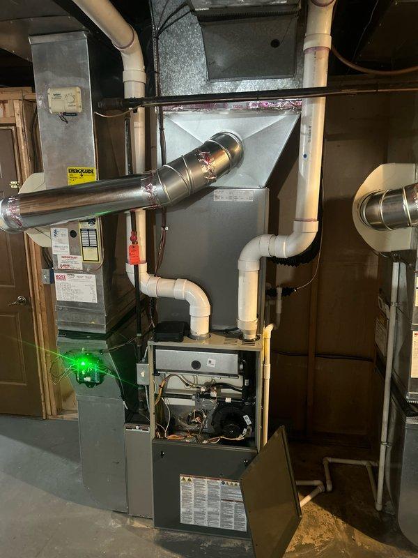 Completed installation of 4-ton air conditioning system with matching evaporator coil on first floor. Installed new A-coil assembly above existing furnace, connected refrigerant lines, and established proper drainage with PVC condensate piping. Performed electrical reconnections, tested system operation, and verified proper airflow through ductwork connections. Mechanical and electrical permits requested for installation compliance.