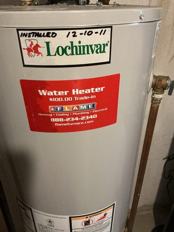 Replaced failed 50-gallon residential tanked water heater that was experiencing catastrophic leakage from the bottom of the tank. Removed and properly disposed of the original Lochinvar unit that had been in service since 2011. Installed new 50-gallon tanked water heater with proper connections to existing copper supply lines and drain piping. Verified all connections for leaks, tested temperature and pressure relief valve operation, and ensured proper venting and combustion air supply. Unit commissioned and left in full operational status.