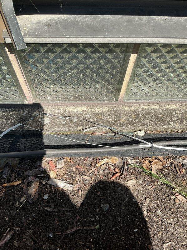 Responded to no-cool condition on 8-year-old air conditioning system affecting entire basement unit. Upon arrival, discovered outdoor unit had been inadvertently unplugged, likely during previous service visit. Reconnected power supply to condensing unit, verified proper electrical connection at disconnect, and confirmed system operation with normal startup sequence. Unit cooling properly upon departure.