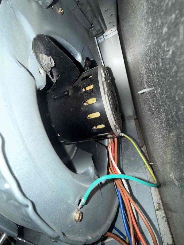 Responded to no cooling complaint on 14-year-old residential air conditioning system. Upon arrival, performed diagnostic testing on both indoor blower motor assembly located in basement and outdoor condensing unit. Utilized digital clamp meter to measure electrical draw and verify proper voltage supply to compressor and condenser fan motor. Inspected blower motor electrical connections and terminals, confirming wire integrity and secure connections at motor capacitor. Evaluated outdoor unit for proper operation, checking refrigerant pressures and amperage draw on compressor. System restored to normal cooling operation following diagnostic procedures and minor adjustments to electrical connections.