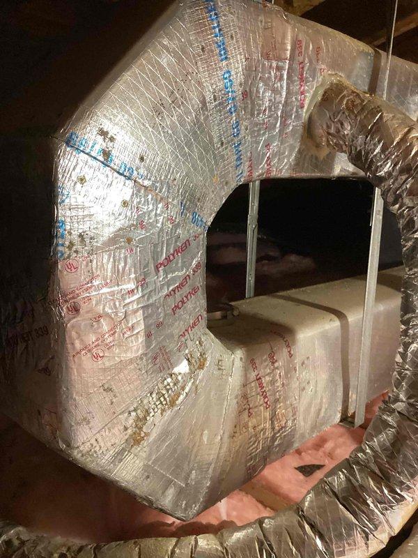Provided estimate for complete Unico system replacement in attic location. Current 25-year-old unit is non-operational due to refrigerant leak and has reached end of serviceable life. Assessed existing flexible ductwork configuration and attic access conditions to determine replacement specifications and installation requirements.