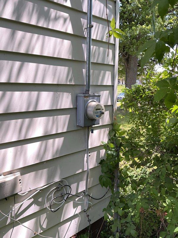 Conducted on-site evaluation of a non-functioning 12-year-old residential air conditioning system for replacement estimate. Assessed existing outdoor condensing unit positioned on side of home, documented current equipment condition and installation location including electrical disconnect and service access. Provided comprehensive replacement options for whole-house cooling system based on equipment age and operational failure.