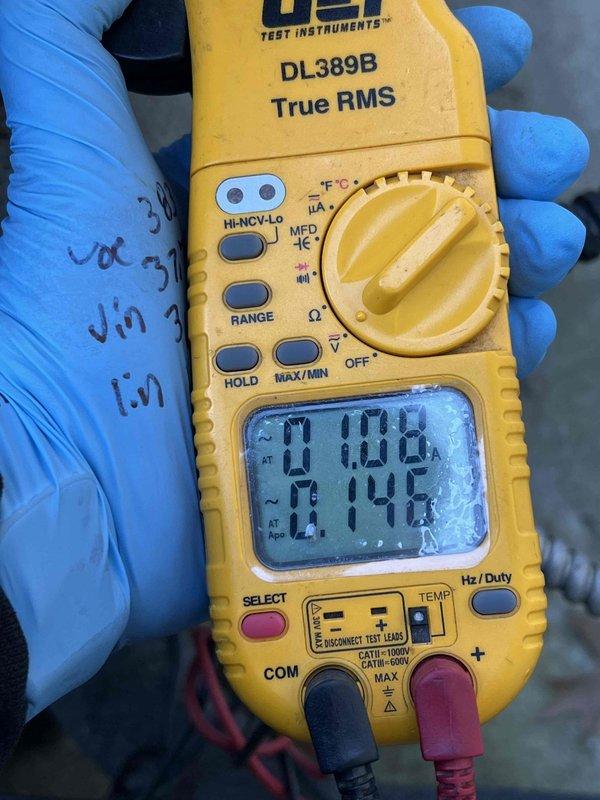 # HVAC Service Completed

Responded to service call for 11-year-old ICP air conditioning system experiencing inadequate cooling. Customer reported unit running continuously but failing to reach set temperature, suspecting low refrigerant charge.

Upon arrival, performed comprehensive AC tune-up and diagnostic evaluation. Conducted electrical measurements using digital multimeter to verify proper amperage draw on compressor and system components. Measured current readings showing 61.08 and 61.45 amps, indicating compressor operation within expected parameters for the unit size.

Inspected refrigerant system for potential leaks or charge issues as reported by customer. Evaluated system performance including temperature differential across evaporator coil, suction and discharge pressures, and overall cooling capacity. Checked airflow across indoor coil and verified proper air handler operation.

Performed standard tune-up procedures including cleaning condenser coil, checking electrical c