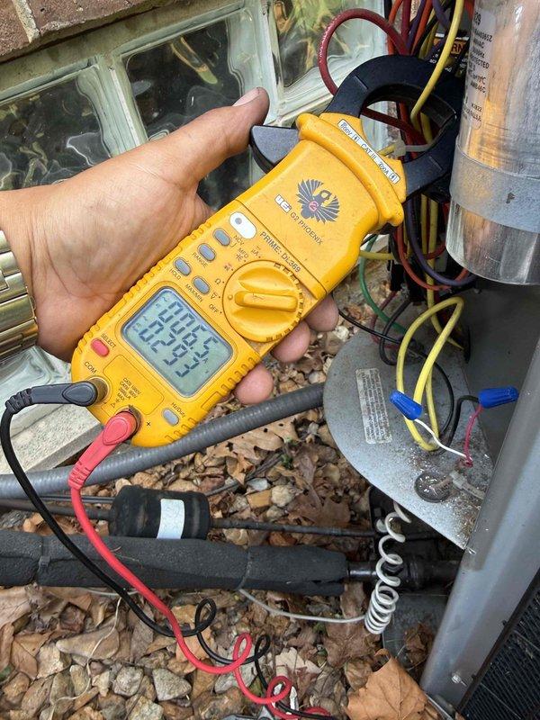 Responded to no cooling call on 15-year-old air conditioning system with condensing unit located in basement coil area. Upon arrival, confirmed unit would not power on. Performed diagnostic testing using digital multimeter on outdoor condensing unit to measure voltage and electrical continuity across key components. Testing focused on capacitor, contactor, and associated wiring connections to identify failure point preventing system operation. Based on equipment age and observed conditions during testing, provided homeowner with repair options and recommendations for restoring cooling functionality.