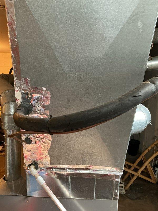 Conducted comprehensive assessment of 10-year-old residential air conditioning system with R22 refrigerant experiencing cooling failure in lower level. Evaluated existing dual-zone HVAC configuration with oversized equipment and deteriorated insulation on refrigerant lines. Provided estimate for AC replacement with recommendation to potentially consolidate to single-system design for improved efficiency and performance, noting basement coil location and depleted refrigerant charge requiring system replacement rather than repair.