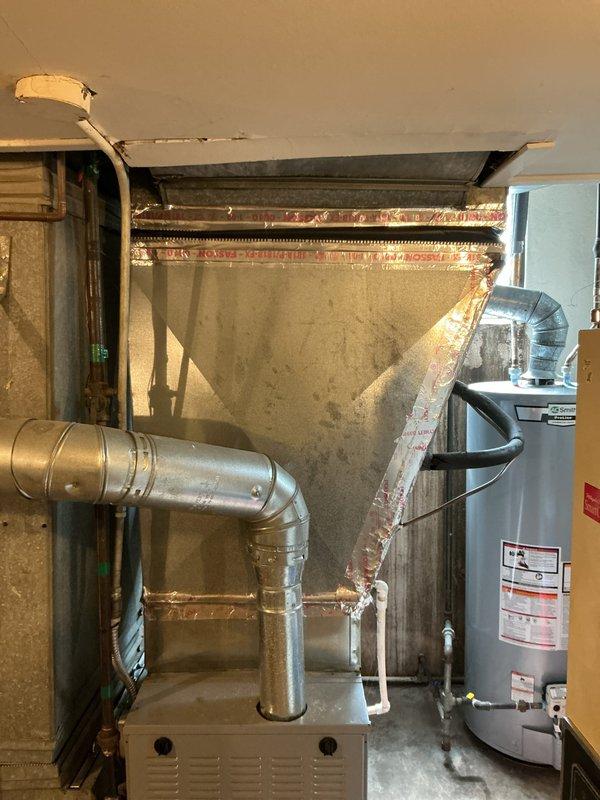 Conducted comprehensive assessment of 10-year-old residential air conditioning system with R22 refrigerant experiencing cooling failure in lower level. Evaluated existing dual-zone HVAC configuration with oversized equipment and deteriorated insulation on refrigerant lines. Provided estimate for AC replacement with recommendation to potentially consolidate to single-system design for improved efficiency and performance, noting basement coil location and depleted refrigerant charge requiring system replacement rather than repair.