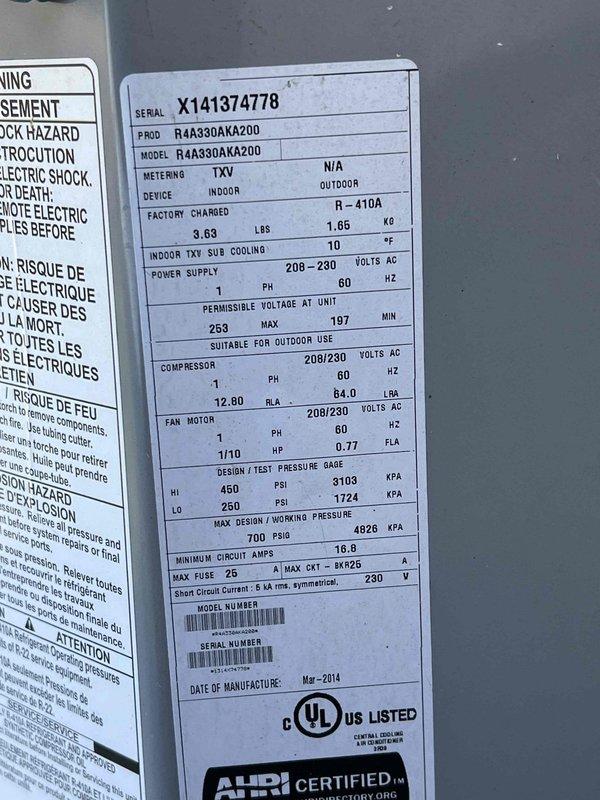 Responded to no-cooling complaint with warm air circulating from central air conditioning system. Upon arrival, inspected 2014 Goodman R4A3 series condensing unit (Model R4A330AKA200, Serial X141374778) rated for R-410A refrigerant at 208-230V AC. Accessed electrical panel to verify power supply and circuit integrity to outdoor unit. Documented equipment nameplate specifications and existing electrical distribution setup for diagnostic purposes. System requires further troubleshooting to identify root cause of loss of cooling capacity.