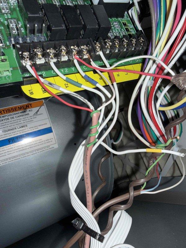 # HVAC Service Report - No Cooling Condition

Responded to service call for 10-year-old air conditioning system with no cooling and failure to start. Upon arrival, performed comprehensive system diagnostics on outdoor condensing unit.

Conducted visual inspection of control board and low-voltage wiring connections at terminal strip. Verified all control wire terminations at Y1, Y2, and C terminals for proper contact and secure connections. Inspected circuit board relays and contactors for signs of failure or damage. 

Examined blower wheel assembly and confirmed fan components were clean and free of obstructions. Verified motor shaft and hub assembly for proper alignment and mechanical integrity. Checked capacitor for bulging or electrical failure.

Tested electrical components including contactor operation, relay functionality, and control voltage at terminal strip. Traced wiring harness for loose connections, breaks, or damaged insulation across all control circuits.

Documented syst