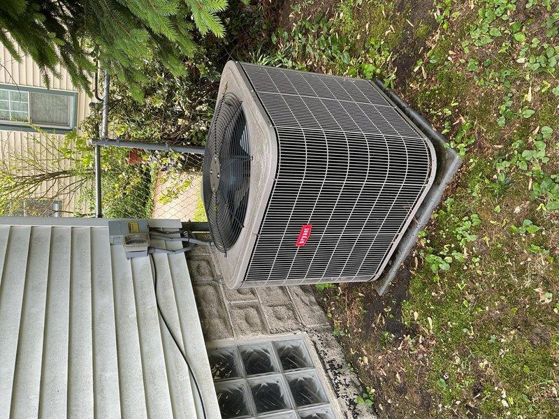 Completed comprehensive Gold AC Inspection on 10+ year old residential air conditioning system with outdoor condenser unit and basement-located air handler. Performed thorough multi-point inspection of all system components, verified operational status of equipment, examined refrigerant lines with foam insulation, inspected electrical connections and controls, checked condensate drainage, evaluated airflow and system performance, and documented equipment condition through photographic records. All components found to be functioning properly at time of inspection.