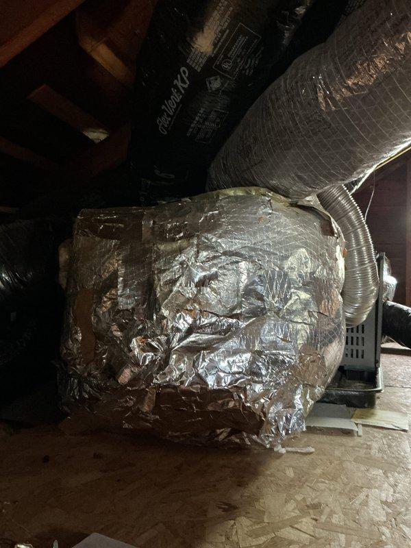 Completed full system HVAC estimate for property with no existing air conditioning. Assessed attic space and existing infrastructure to provide options for both traditional central air conditioning system and ductless mini-split installation. Documented current conditions including attic accessibility, available space for equipment placement, electrical service capacity, and optimal locations for indoor and outdoor unit installation. Photographed existing heating system air handler and ductwork configuration to determine compatibility with proposed cooling solutions. Evaluated insulation requirements, condensate drainage routing, and refrigerant line pathways for both system types to provide comprehensive installation proposals.