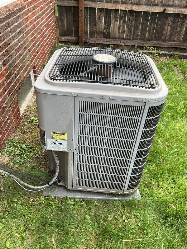 Completed Gold AC inspection on 10+ year old Payne air conditioning system with air handler located in basement. Performed comprehensive evaluation of outdoor condenser unit, verified proper operation of all components, checked refrigerant lines, and confirmed unit clearance and airflow were adequate. Additionally diagnosed thermostat humidifier pad alert issue to determine cause of persistent notification despite recent pad replacement.