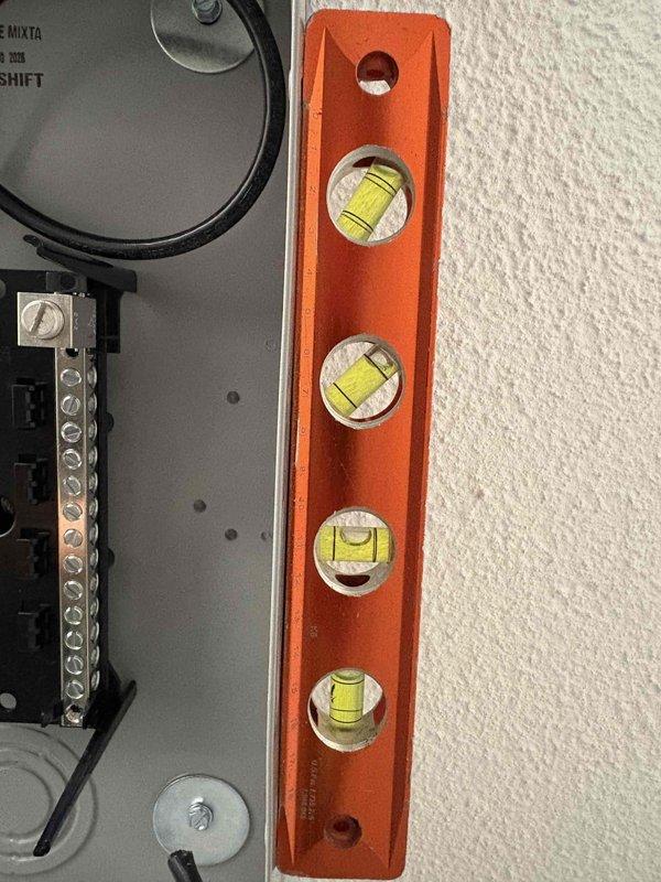 Completed mini split system installation over two-day period with full mechanical and electrical integration. Installed new dedicated electrical circuit with breaker panel modifications to support mini split system requirements, ensuring proper power supply and code compliance. All equipment mounted, leveled, and tested for proper operation with electrical connections verified and secured.