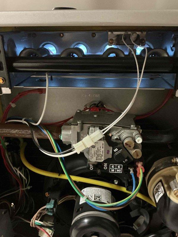 Responded to no heat/no cool call with thermostat displaying no power after reported fuse failure. Inspected electrical circuit and replaced blown fuse at main panel, restoring 24V power to thermostat in dining room. Verified gas furnace ignition sequence with burners firing properly and outdoor condensing unit operational with fan running. System restored to normal heating and cooling operation with thermostat responding correctly to temperature calls.