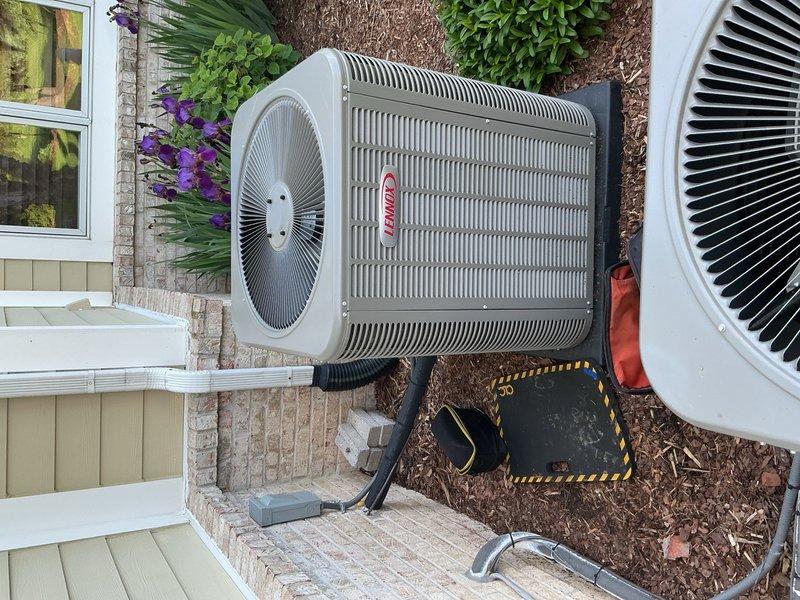 Completed Gold AC Inspection on dual-zone residential HVAC system with 2-year-old Lennox equipment. Performed comprehensive diagnostic evaluation including refrigerant pressure testing using manifold gauges on outdoor condensing unit. Inspected air handler locations in basement and second-story installation. Verified system operational status and cooling performance. Advised customer regarding condenser clearance requirements and removal of debris and organic material from equipment surroundings to maintain proper airflow and system efficiency.
