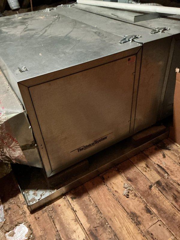 Conducted site assessment for estimate to add supply runs to existing Unico system. Inspected Lennox air handler unit located in attic space and evaluated basement mechanical area for potential ductwork routing. Documented current HVAC configuration and spatial constraints to determine feasibility and scope of adding additional supply distribution to improve system coverage.