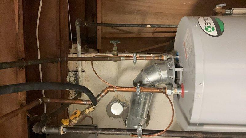 Completed comprehensive Gold AC Inspection on a 16-year-old air conditioning system with air handler located in basement. Performed thorough examination of outdoor condenser unit, which was found positioned on concrete pad with adequate clearance, though customer was advised that the area surrounding the condenser needs to be maintained clear of debris and any animal waste for optimal performance and longevity. Inspected all refrigerant lines, electrical connections, and condensate drainage system including PVC discharge line. Evaluated indoor air handler components, ductwork connections, and associated plumbing infrastructure in basement mechanical room. Verified system operational parameters and documented equipment condition with photographic records. Provided customer with maintenance recommendations to ensure continued efficient operation of aging HVAC equipment.