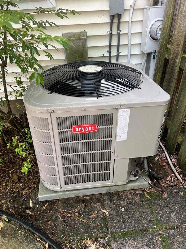 Completed comprehensive Gold AC inspection on 16-year-old Bryant air conditioning unit located at residential property. Performed full system evaluation including refrigerant pressure checks, electrical component testing, condenser coil inspection, and fan motor operation verification. Unit found to be operating within normal parameters with no immediate service needs identified. Confirmed proper airflow through condenser coils and verified electrical connections at outdoor disconnect and power supply. Documented equipment condition with photographic records showing unit positioned on concrete pad with adequate clearance from surrounding landscaping and utility infrastructure.