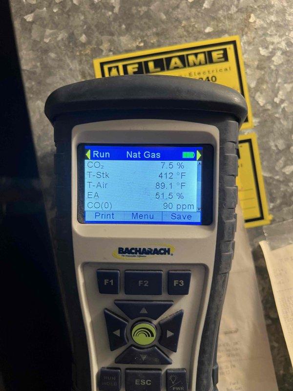 Completed Gold Furnace Inspection on 19-year-old natural gas furnace located in basement. Performed combustion analysis using Bacharach analyzer, recording stack temperature of 412-442°F, oxygen level of 7.7%, carbon dioxide at 7.5%, carbon monoxide at 57-90 ppm, and combustion efficiency at 80.3%. Unit confirmed operational with all safety systems functioning properly. Special Carrier filter available at Carrier Madison Heights under PO: 1322269-001 for future maintenance needs.