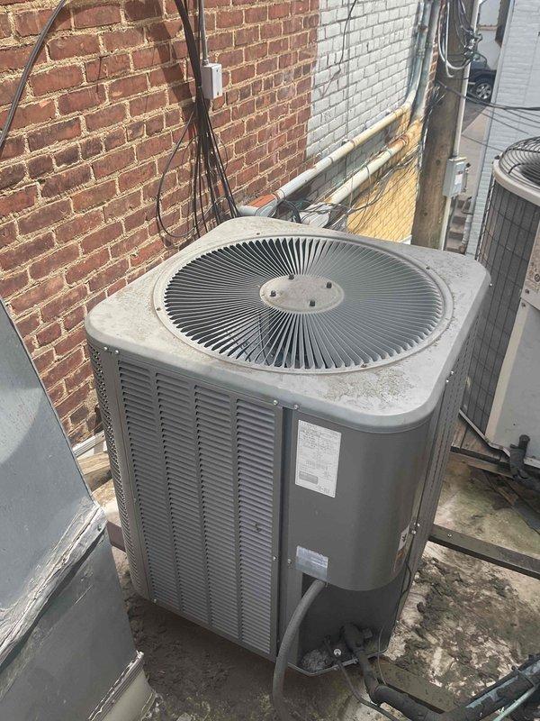 Responded to no-cool call for rooftop commercial AC unit. Upon arrival, found outdoor condensing unit with heavily restricted airflow due to excessive dirt, dust, and lint accumulation on condenser coil fins. Unit age confirmed at 10+ years with R-22 refrigerant system. Documented equipment condition showing significant debris buildup compromising heat transfer efficiency. Advised customer of required condenser coil cleaning and comprehensive system evaluation to address cooling failure and reported refrigerant leak.