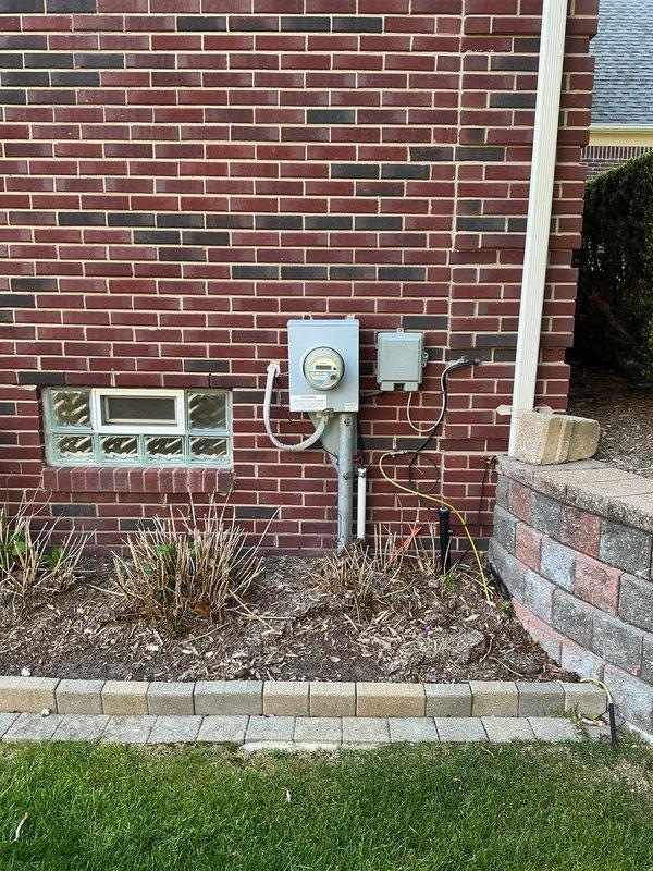 Completed full HVAC system installation including a 110,000 BTU furnace, 4-ton air conditioning unit, and whole-home humidifier. Positioned condensing unit in right side yard against brick exterior wall with proper clearances, installed PVC venting through wall with appropriate trap configuration, and coordinated electrical service upgrades with licensed electrician for system power requirements. Performed system startup, charged refrigerant lines to manufacturer specifications using manifold gauges, reconnected all utilities, and verified proper operation of all heating, cooling, and humidification components.