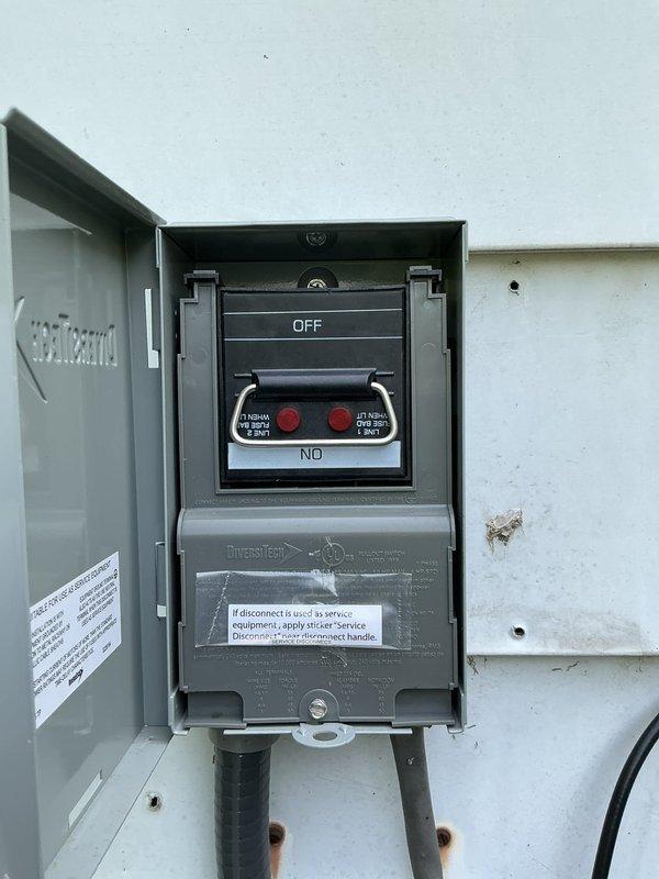 Responded to no cooling complaint on residential air conditioning system installed in February 2026. Upon arrival, confirmed thermostat was calling for cooling and indoor blower was operating, but outdoor condensing unit was not running. Performed electrical diagnostics at outdoor unit using digital multimeter to test compressor windings and electrical components.

Testing revealed compressor failure with abnormal resistance reading of 840 ohms from start winding to ground, indicating internal winding short to compressor housing. Verified power supply at disconnect switch and confirmed all safety controls were functioning properly. Determined compressor had failed internally despite unit being under one year old and having completed spring startup service in April 2026.

Recommended and received approval for compressor replacement under warranty coverage. Removed failed compressor from system for further diagnostic evaluation at shop. Secured disconnect switch in OFF position and infor