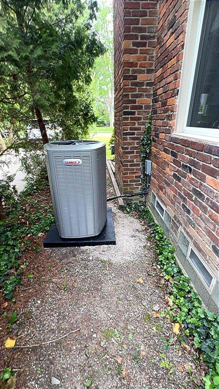 Completed full installation of 3-ton Lennox air conditioning system with matching evaporator coil at residential property. Unit positioned on platform on right side of home with proper clearances maintained. Obtained mechanical, electrical, and air conditioning permits prior to installation. Reconnected all electrical and refrigerant lines, performed system startup, and verified proper operation of complete HVAC system.
