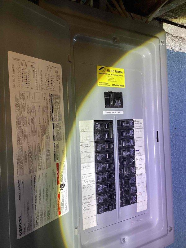Conducted site evaluation for air conditioning replacement at residential condominium. Assessed existing Lennox condensing unit located on exterior concrete pad in confined alcove space adjacent to deck, documented installation constraints including surrounding brick walls and proximity to window. Evaluated electrical service at main panel, verified circuit capacity and existing A/C disconnect for replacement system compatibility, and provided comprehensive replacement quote for aging air conditioning system.