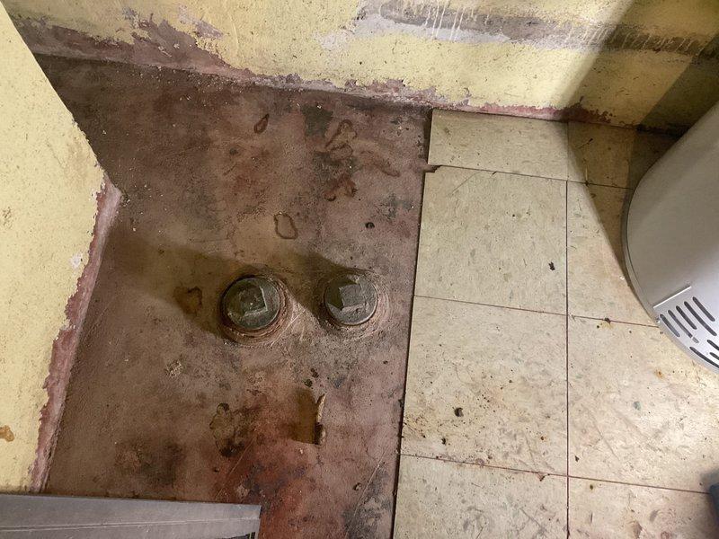 Corrected code violation on water heater recirculation system by removing non-compliant black iron pipe fittings and replacing with approved brass/galvanized nipples and fittings per P2906.5 and P2906.6 plumbing code requirements. Reconnected existing recirculation line to water heater with code-compliant materials for proper water distribution system operation.