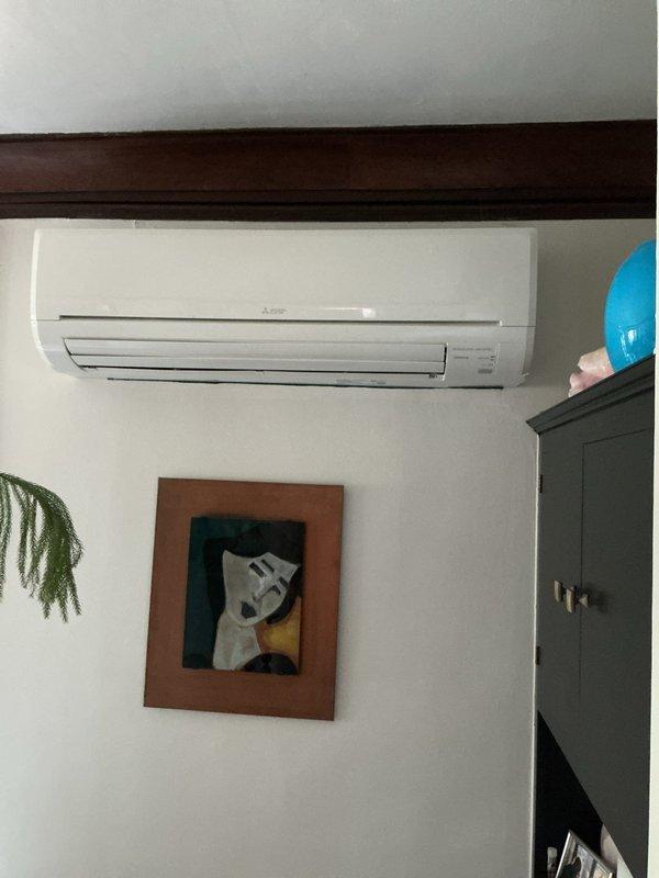 Responded to service call for Mitsubishi mini-split system with one outdoor condenser and three indoor wall-mounted units reporting warm air discharge from all zones. Upon arrival, performed visual inspection of outdoor unit located on concrete pad in backyard and indoor evaporator units installed in bedrooms and living room. Conducted system diagnostics to identify cause of insufficient cooling. Checked refrigerant pressures, electrical connections, and thermostat settings across all zones. Verified proper operation of outdoor condenser fan and compressor. Inspected indoor units for airflow restrictions and proper mounting. System restored to normal cooling operation following diagnostic procedures and minor adjustments.