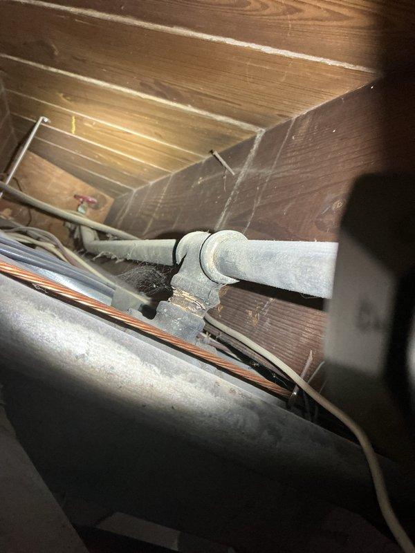 Responded to service call for leaking outdoor spigot. Upon arrival, conducted thorough inspection of exterior hose bib and surrounding plumbing connections. Accessed attic space to examine supply lines and verify no additional leaks were present in upstream piping. Identified source of leak at spigot valve assembly, performed necessary repairs to stop water seepage, and tested system to confirm proper operation and complete water shutoff when valve closed.