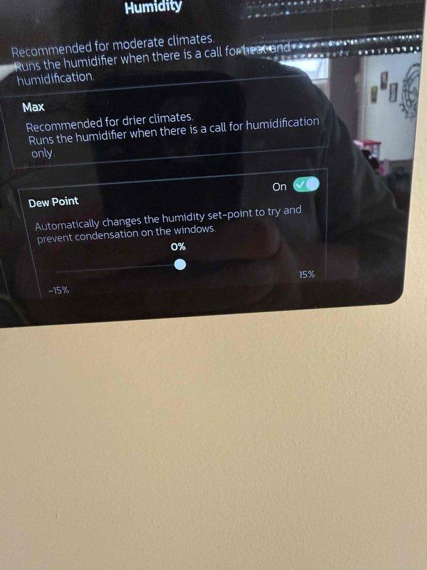 Completed installation of control balancing sensor in office location. Configured humidity control settings on digital thermostat interface, including dew point functionality to prevent window condensation. System programmed and operational, with all humidity parameters set according to manufacturer specifications.