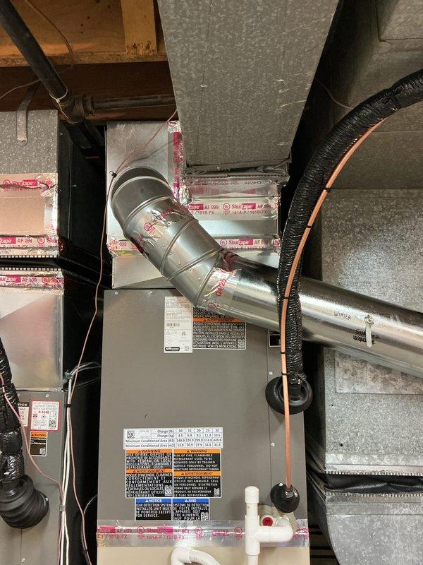 Successfully completed installation of new air conditioning unit and evaporator coil system. The indoor coil was integrated with the existing furnace system, with proper refrigerant charging performed according to manufacturer specifications. All ductwork connections were sealed with foam insulation strips to prevent air leakage, and the system was tested to ensure proper operation and compliance with safety standards.