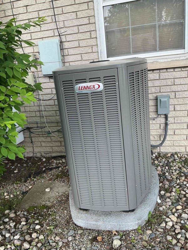 Completed comprehensive Gold AC Inspection on basement-located Lennox air conditioning system. Performed detailed system diagnostics including airside measurements which confirmed optimal performance with 15.6°F delta T, supply air temperature of 54.3°F, and return air at 69.9°F. Inspected outdoor condenser unit, verified proper installation on concrete pad with adequate clearance, confirmed electrical disconnect functionality, and documented all system parameters within manufacturer specifications.