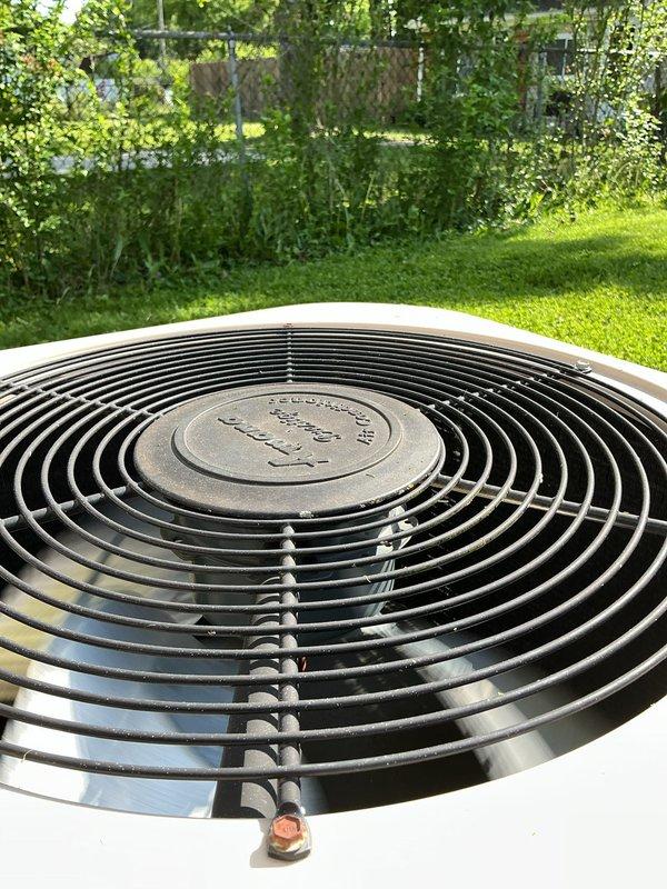 Completed comprehensive cooling season tune-up on residential air conditioning system that had not been serviced for approximately two seasons. Performed standard maintenance protocol including inspection of outdoor condensing unit, which showed accumulated dirt and debris on condenser coils and heat exchange fins, along with minor rust formation on protective grille components. Verified system operational status, cleaned unit components, and confirmed proper functioning of all mechanical systems to ensure optimal cooling performance for the upcoming season.