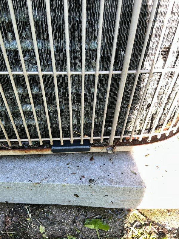 Completed comprehensive cooling season tune-up on residential air conditioning system that had not been serviced for approximately two seasons. Performed standard maintenance protocol including inspection of outdoor condensing unit, which showed accumulated dirt and debris on condenser coils and heat exchange fins, along with minor rust formation on protective grille components. Verified system operational status, cleaned unit components, and confirmed proper functioning of all mechanical systems to ensure optimal cooling performance for the upcoming season.