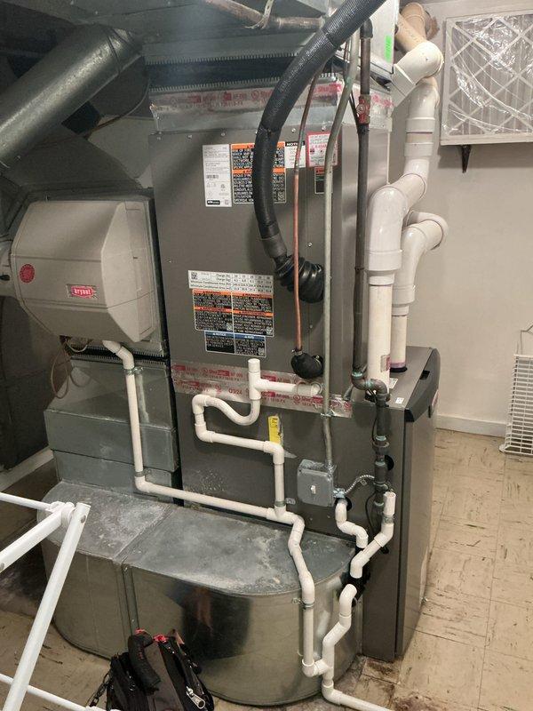 Completed comprehensive Gold AC inspection on 1-year-old residential HVAC system with basement-located air handler. Inspected and verified proper operation of furnace, condensate drainage system, humidification equipment, and thermostat controls. All equipment found operating within normal parameters with adequate airflow, proper drainage function, and no immediate service concerns identified.