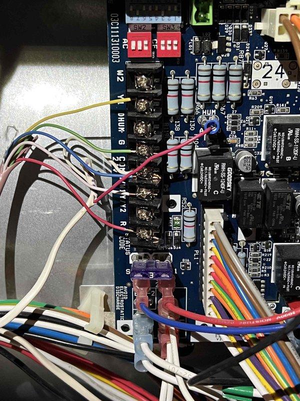 Responded to warranty call for newly installed furnace not producing heat, with home temperature at 60 degrees. Upon inspection of basement-mounted unit, diagnosed faulty control board preventing proper system operation. Inspected electrical connections, relay assembly, and circuit board components including terminal blocks, DIP switches, and capacitors. Identified control board failure as root cause of no-heat condition. Replaced defective control board with new unit, verified all wire connections to proper terminals including evaporator, compressor, and motor circuits. Tested system operation through complete heating cycle, confirmed proper relay function and sequencing. Verified thermostat communication and system response. Unit now operating within manufacturer specifications, delivering heat as designed. All safety controls functioning properly.