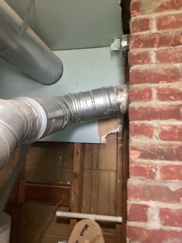 Completed HVAC estimate for replacement of 11-year-old air conditioning system with leaking evaporator coil located in basement. Customer declined repair option after previous diagnostic visit identified refrigerant leak requiring leak search, repair, and refrigerant recharge. Assessed existing system configuration including coil installation adjacent to water heater in mechanical room with flexible ductwork routing through basement structure. Provided comprehensive replacement estimate for new equipment installation to address failed component and restore cooling capacity to residence.