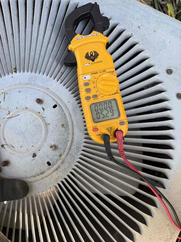 Responded to no cooling call on 10-year-old air conditioning system with evaporator coil located in basement. Upon arrival, confirmed unit would not power on. Performed electrical diagnostics using clamp meter at outdoor condenser unit to test voltage and amperage at compressor and fan motor connections. Inspected condenser coil for debris accumulation and airflow restrictions. Identified failed component preventing system startup and advised homeowner of necessary repairs to restore cooling operation.
